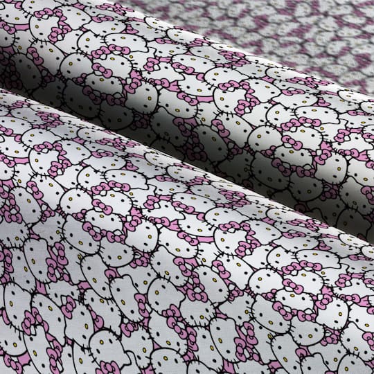 Hello Kitty® Packed Pink Bow Cotton Fabric